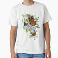 Monarch butterflies on wildflowers by Mariel Angel GJ
