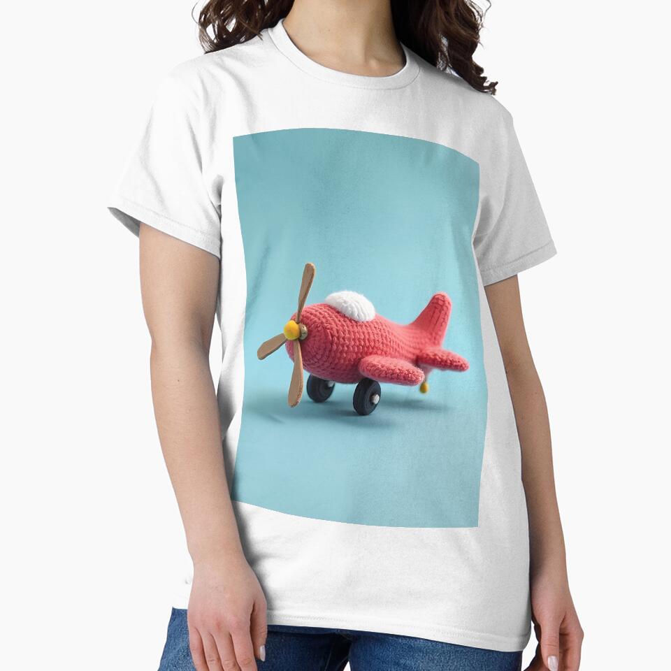 Crocheted red toy airplane on blue by Mianku | Für das Leben